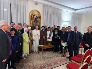 Photo 1: Visiting Pope Francis (second and third on the Popeâs right side: Thomas K. Johnson and Kyai Haji Yahya Cholil Staquf) Â© Thomas K. Johnson