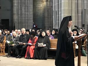 Photo: Ecumenical Patriarch Bartholomew I preaches at the 70th anniversary service of the WCC in Geneva Cathedral. In the background the WCC presidium Â© BQ/Warnecke