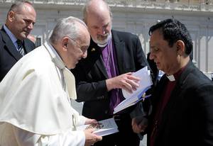 Photo: The Bishops Howell and Schirrmacher handing over the two books by the Global Christian Forum to Pope Francis Â© Osservatore Romano 242459_27062018.jpg