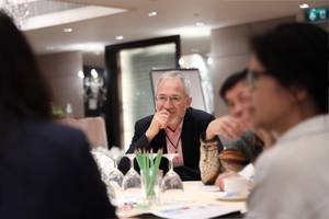 Photo: Prof. Dr. Christof Sauer listening to human rights defenders in Asia Â© SEAFORB