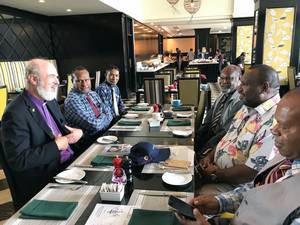Photo: Working breakfast of Thomas Schirrmacher with the Prime Minister of Papua New Guinea James Marape (2nd from right) and the board of the Evangelical Alliance of Papua New Guinea Â© BQ/Thomas Schirrmacher
