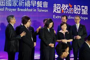 Photo: Bishops and pastors pray for Taiwanese President Tsai Ing-wen after her speech Â© BQ/Warnecke